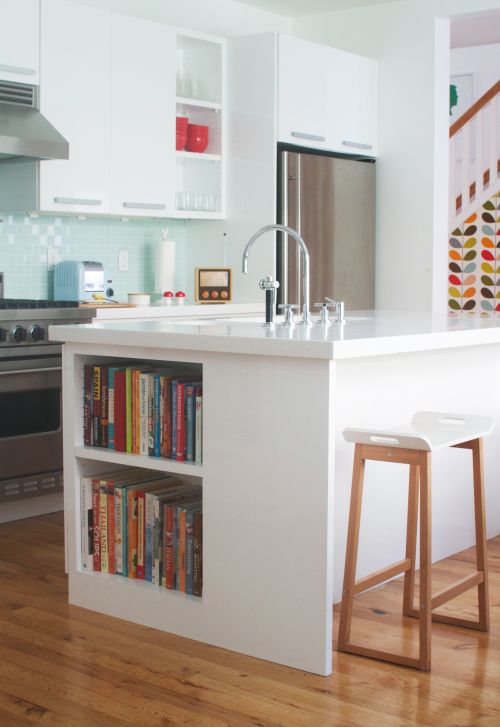 Building bookshelves into kitchen counters is so handy and a great space saver