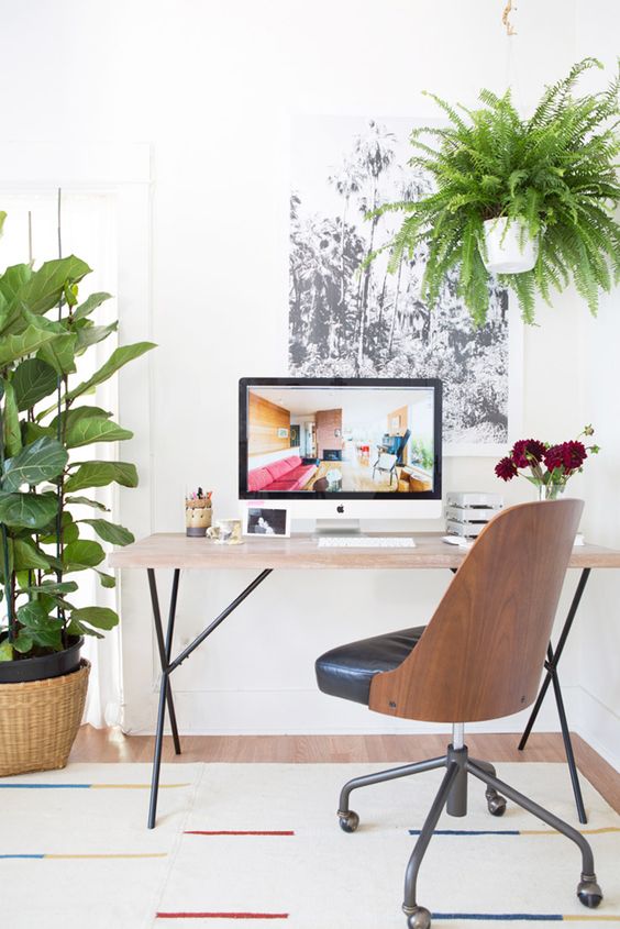Sneak peek into Amber Thrane Of Dulcet Creative's chic, vintage-inspired office space featuring industrial-style shelving: 