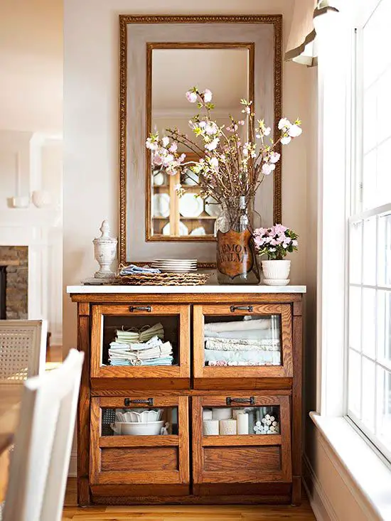 Lend farmhouse charm to your dining room with a grain bin repurposed as a buffet. The deep drawers are suited for storing linens and party staples, such as candles and special occasion china! http://www.bhg.com/decorating/storage/projects/from-flea-market-finds-to-savvy-storage/?socsrc=bhgpin041615fleamarketstorage&page=16