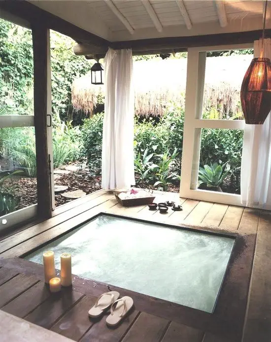 covered backyard hottub. amazing - no worry about bugs or snow covering.