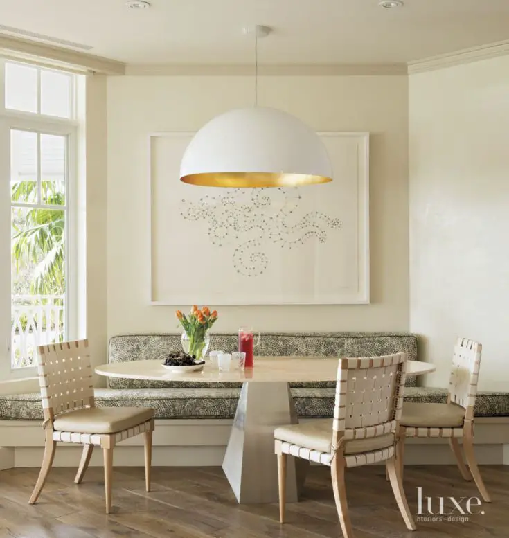Eclectic Cream Dining Area with Banquette Seating: 