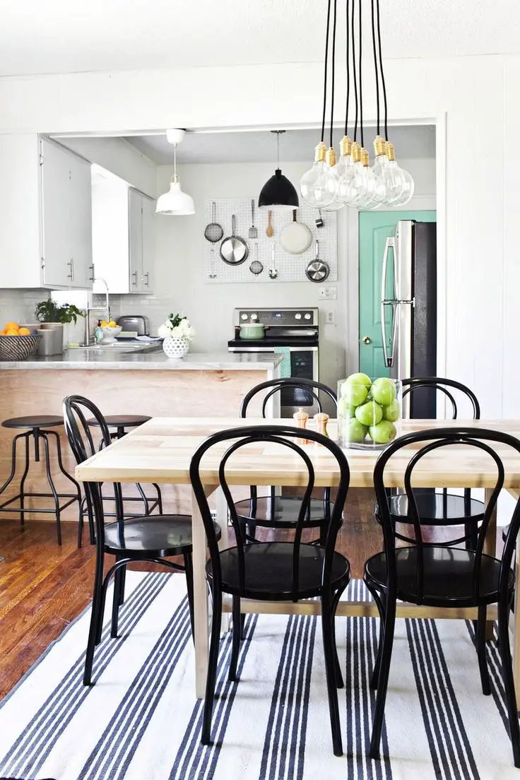Dining room decor. Obsessed with that Schoolhouse Electric chandelier!