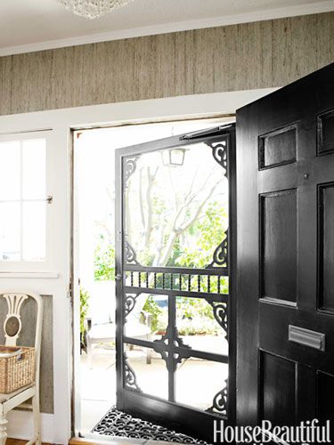 Designer Tobi Tobin commissioned a new screen door for some Victorian charm.
