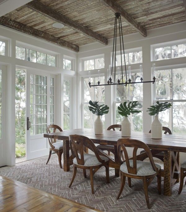 Brick "rug" is a cool idea. Don't have to worry about scraping the wood with the chairs. Hmmmm . . .: 