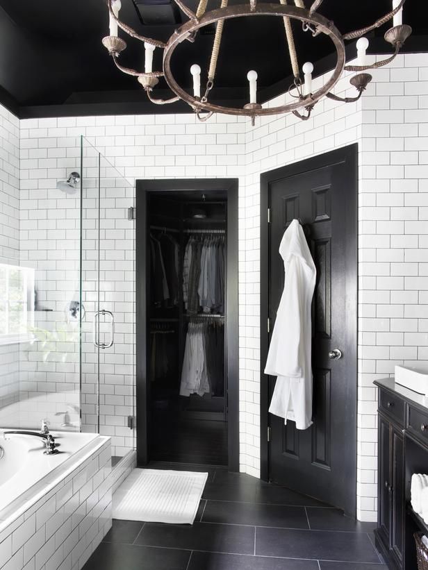 classic black and white; subway tile. Like the porcelain floors an clear glass shower. Brian Patrick Flynn