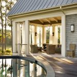round-circular-in-ground-pool-covered-deck-white-outdoor-grommet-drapes