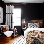 16-rustic-spaces-that-have-us-craving-cold-weather-rustic-interiors-black-bedroom-with-white-stripe-rug-581749baab6b79084cbfe75a-w620_h800
