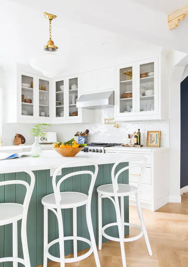 white kitchen with modern barstools