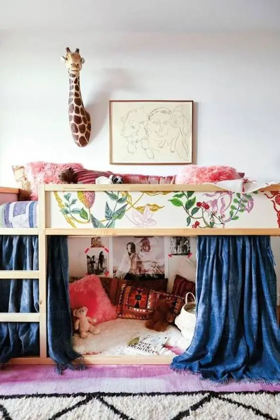 Upgrade your child’s bed panels like this creative parent did using scraps from floral wallpaper. This is just one of the many creative kids room ideas.: 