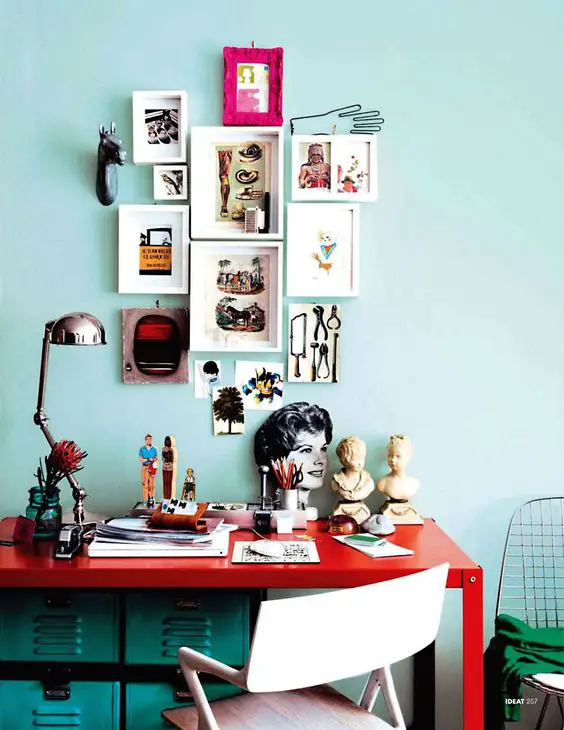 tiffany blue walls, red desk, turquoise file cabinets, fuschia frames - love the hodge podge coloring :-): 