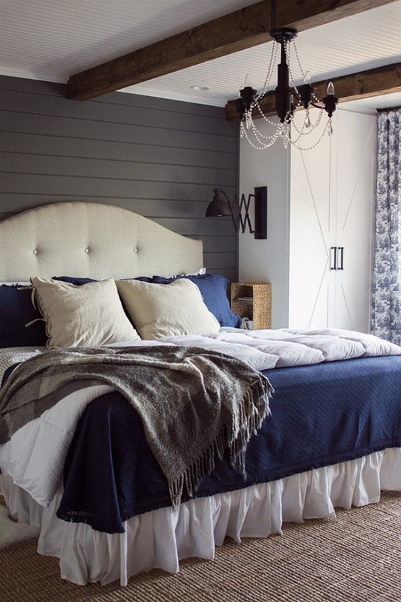 Add a hint of rustic, farmhouse authenticity to a bedroom with gray painted shiplap walls, a white ceiling and exposed wooden beams | Jenna Sue Designs: 