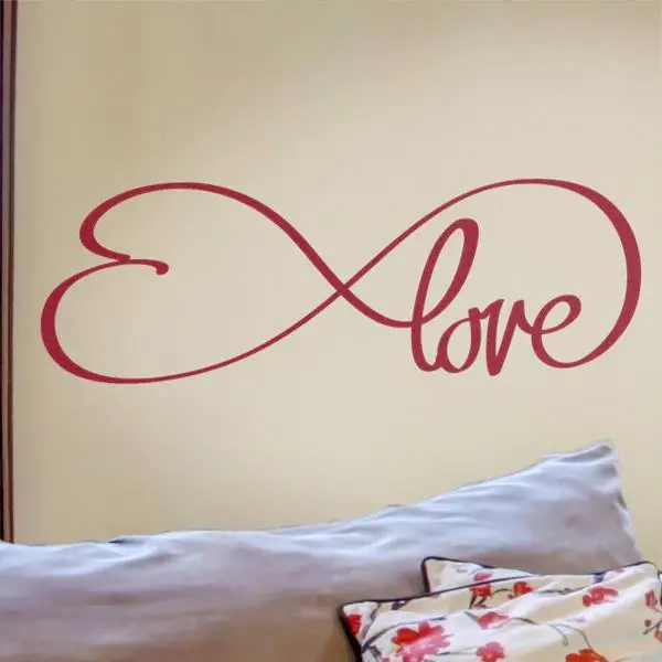 Simple and elegant love wall decal featuring a heart detail from Cozy Wall Art.