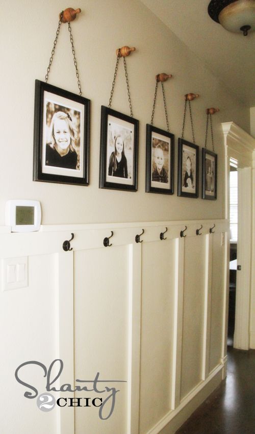 LOVE LOVE LOVE this DIY Wall Art w/chains....Plus, I just love this whole thing.  The hooks below the pictures are perfect!