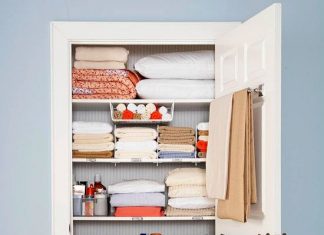Use a towel rod on the inside of the linen closet for holding blankets.