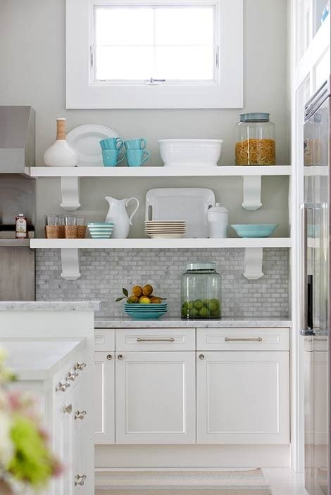 white kitchen cabinets with grey countertops (go darker than these) and light grey walls w/grey mix backsplash