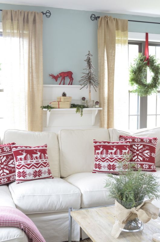 Red + white Christmas living room + love the wreaths hanging on the windows. Gorgeous home tour @4gens1roof
