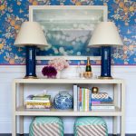 ivory-console-table-glossy-navy-lamps-gray-and-turquoise-poufs