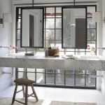 marble-floating-washstand-factory-windows-mirror-suspended-from-ceiling