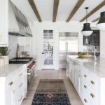 white-kitchen-with-wood-ceiling-beams