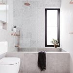 02-rectangular-concrete-bathtub-looks-great-with-marble-tiles