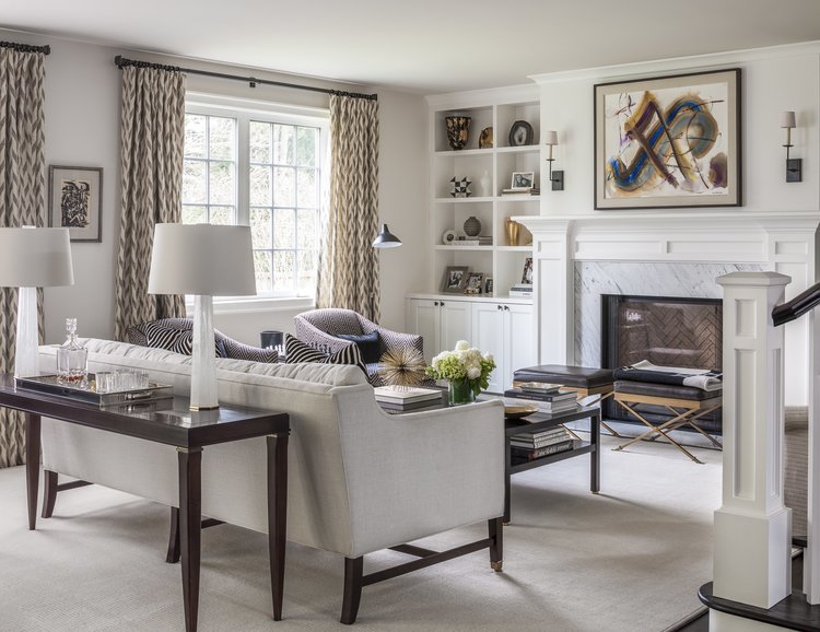 Living room with chairs, coffee table, firework and window with curtains