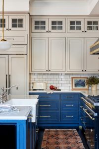 Beige and blue designed kitchen elements, with oven