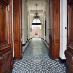 Hallway with tiled flooring