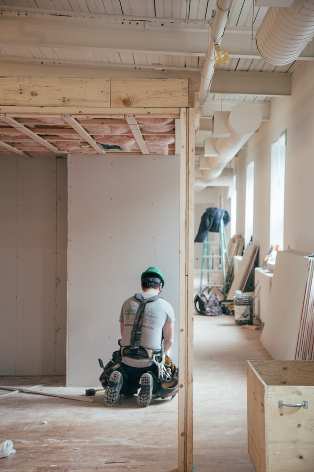 Man renovating a room in the house