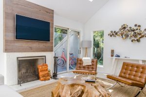 Living room with firework with TV above the firework