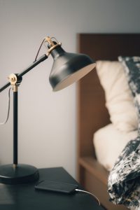 Bedside table with a lamp