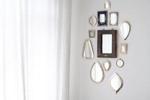 Mirrors on the wall as a way to arrange a small apartment to look spacious