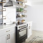 Kitchen with dark oven and white elements