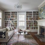 Room with library, sofa, coffee table and firework