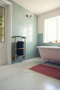 Bathroom with polished flor and bath tub