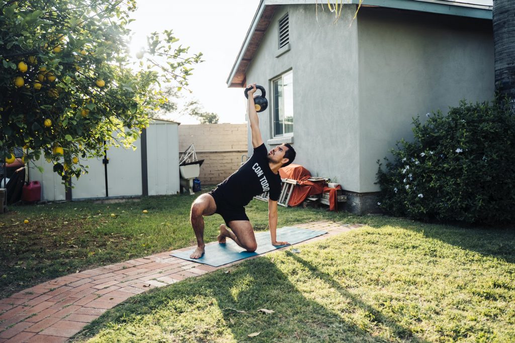 Man working out in the yard