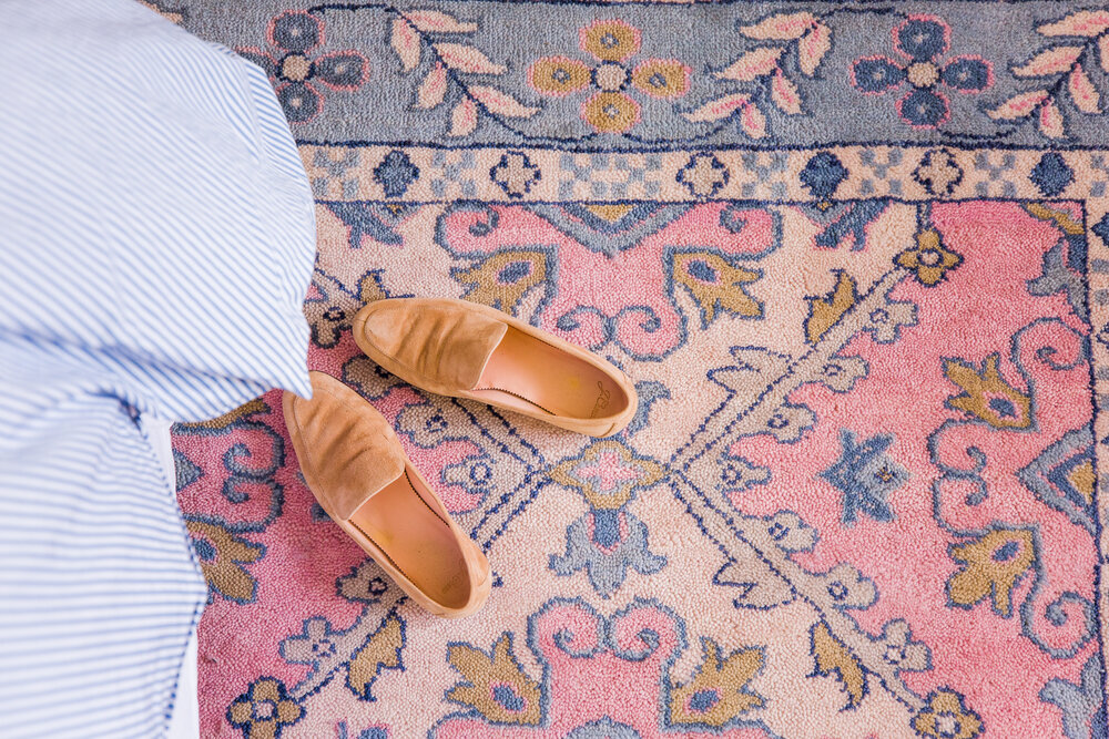 Rug with leather shoes