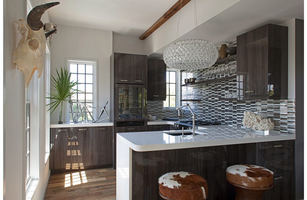 Kitchen with bar table and chairs