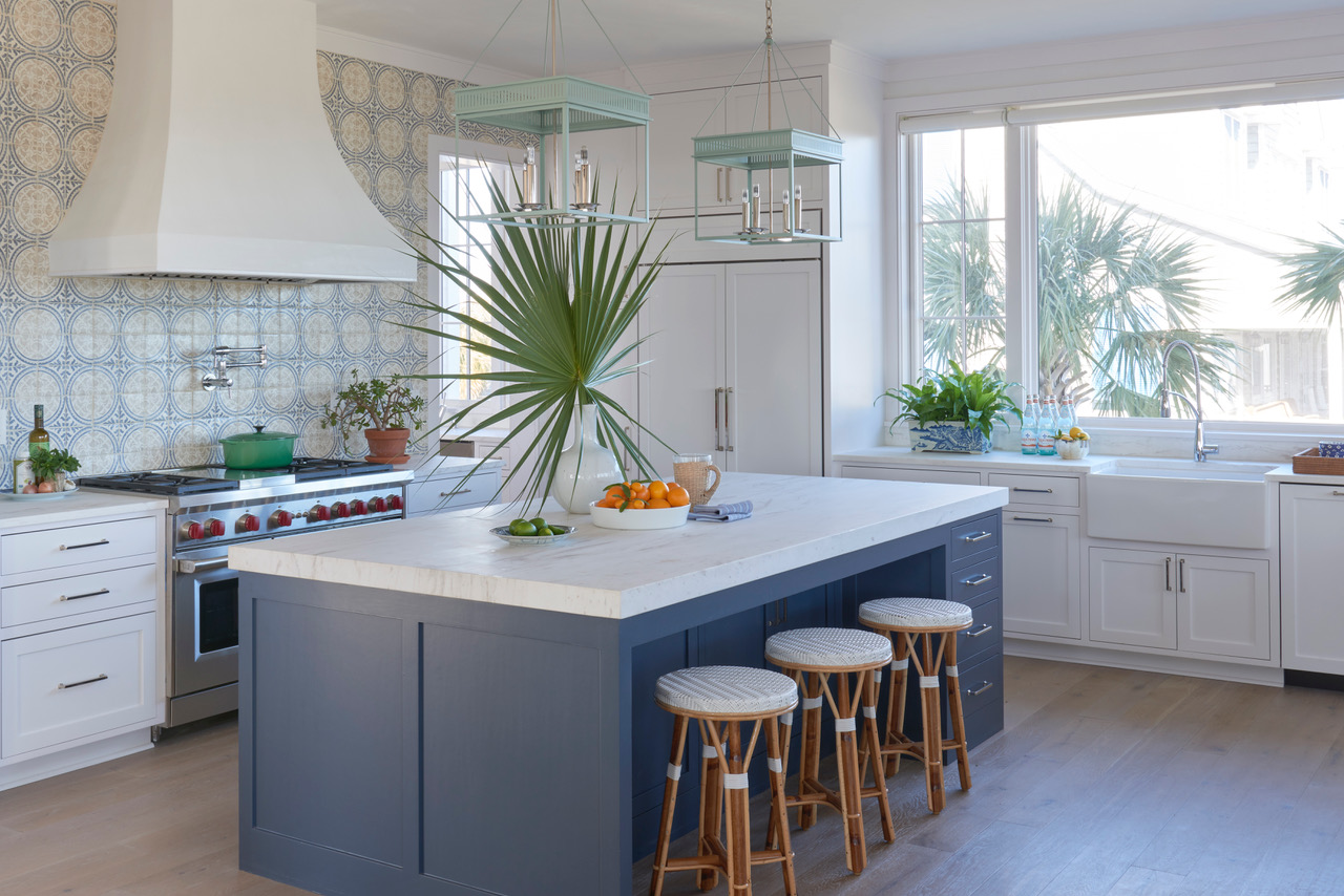 Kitchen with island table and bar chairs