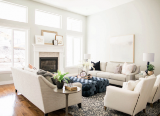 Living room with white armchairs and sofa
