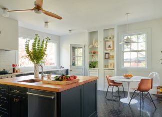 Kitchen and dining room designed in bright and dark colors