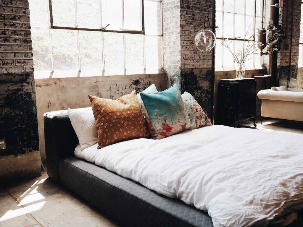 Industrial designed bedroom with double bed