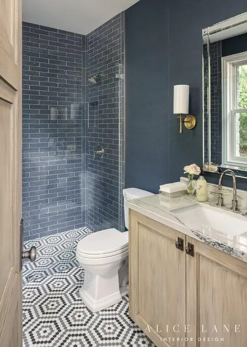 Bathroom with toilet, sink and shower