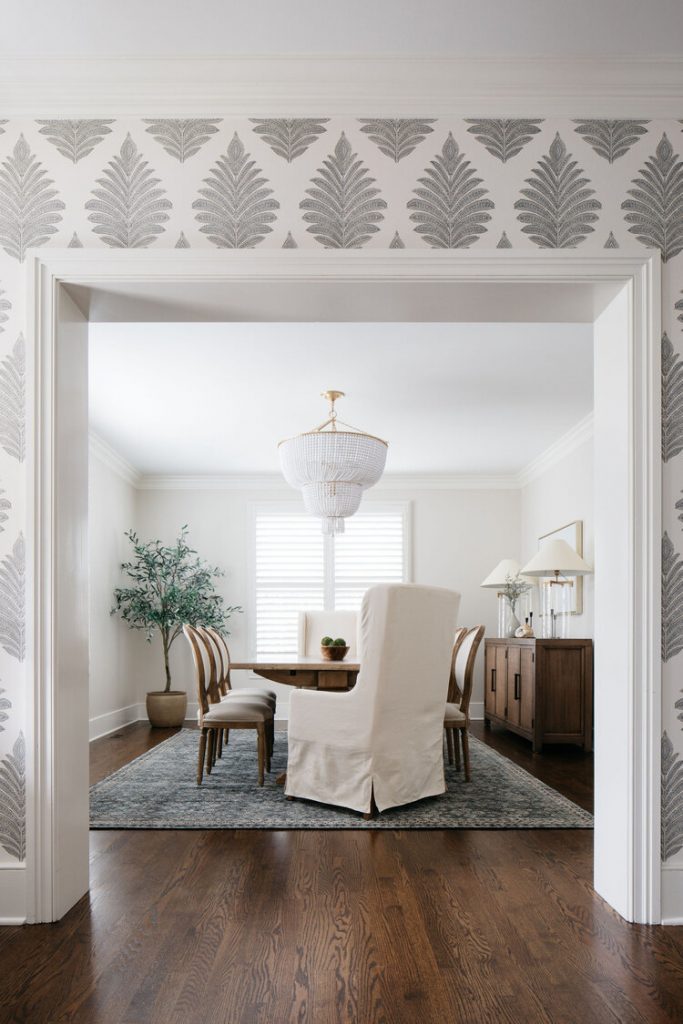 Dinning room with table, chairs and armchair