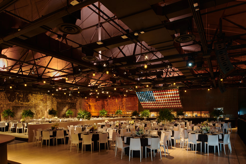 Dinning space with tables, chairs and American flag