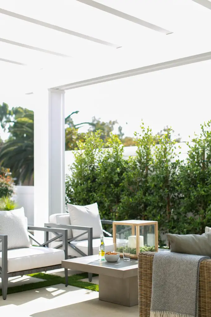 Porch with armchairs and table