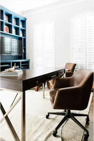 Home office with table, chairs and shelf