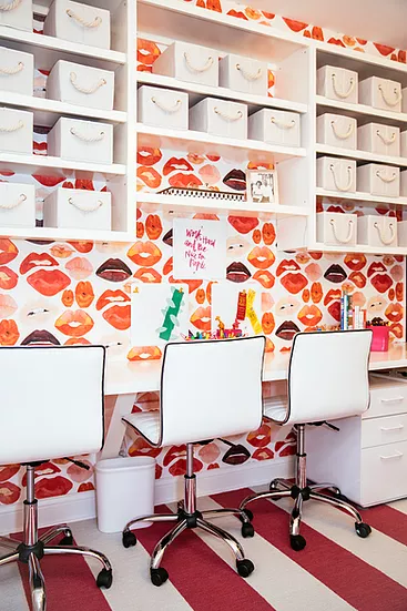 Colorful home office with desk and chairs