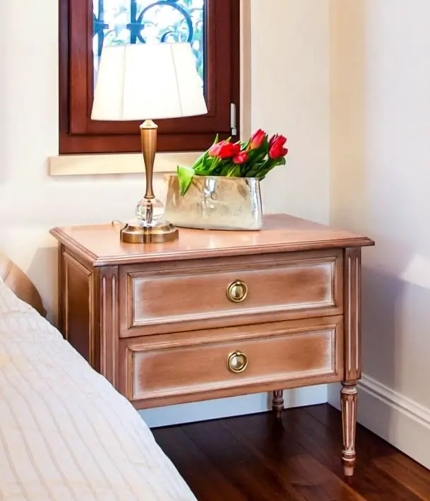 A light colored dresser in classic French style from solid oak. Note the tapering legs. You can feel the exacting standards of a master craftsman. 