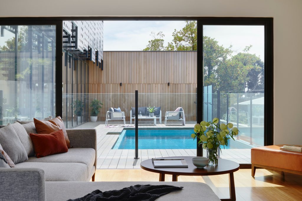 A pool view from a living room