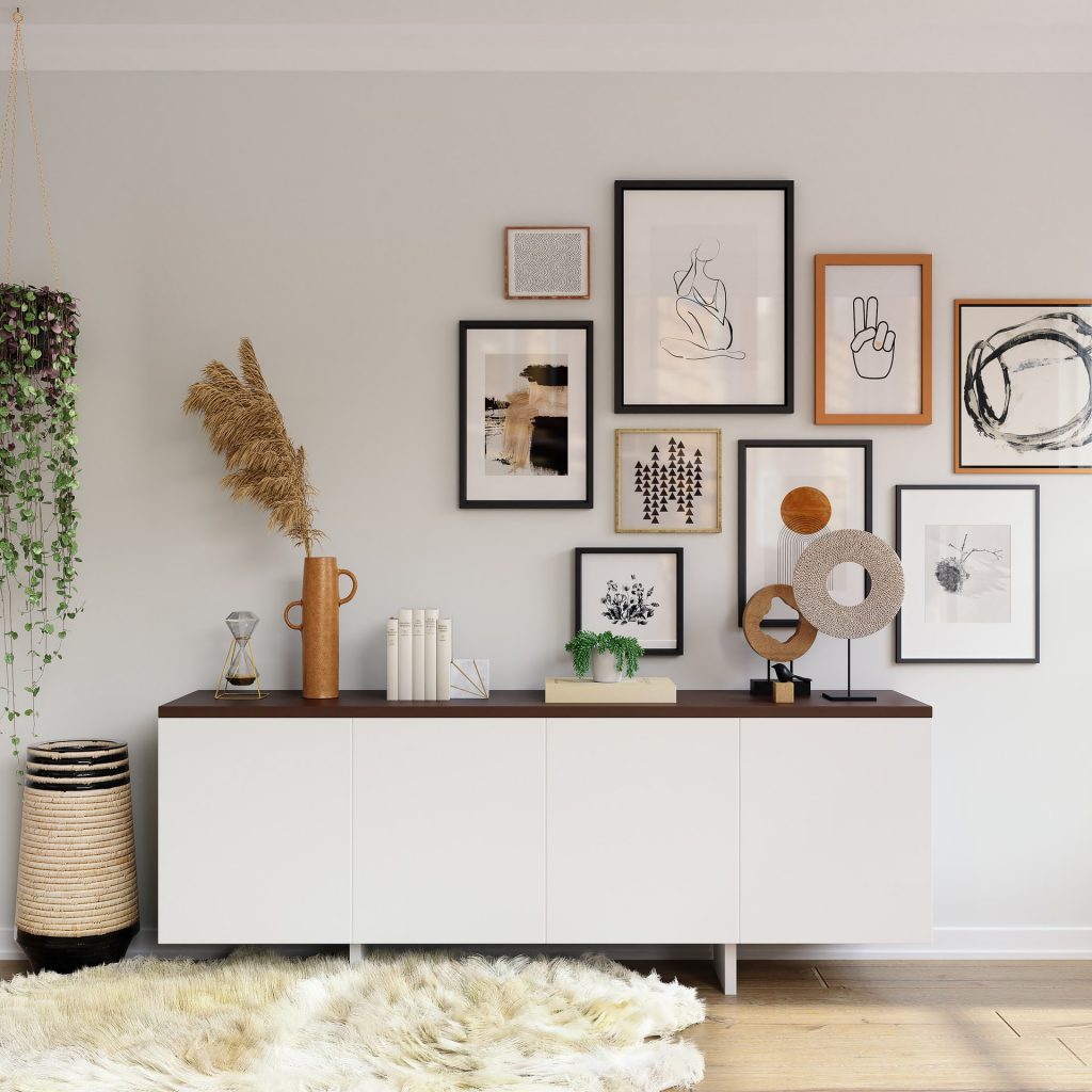 Cabinet in the living room and paintings on the wall above